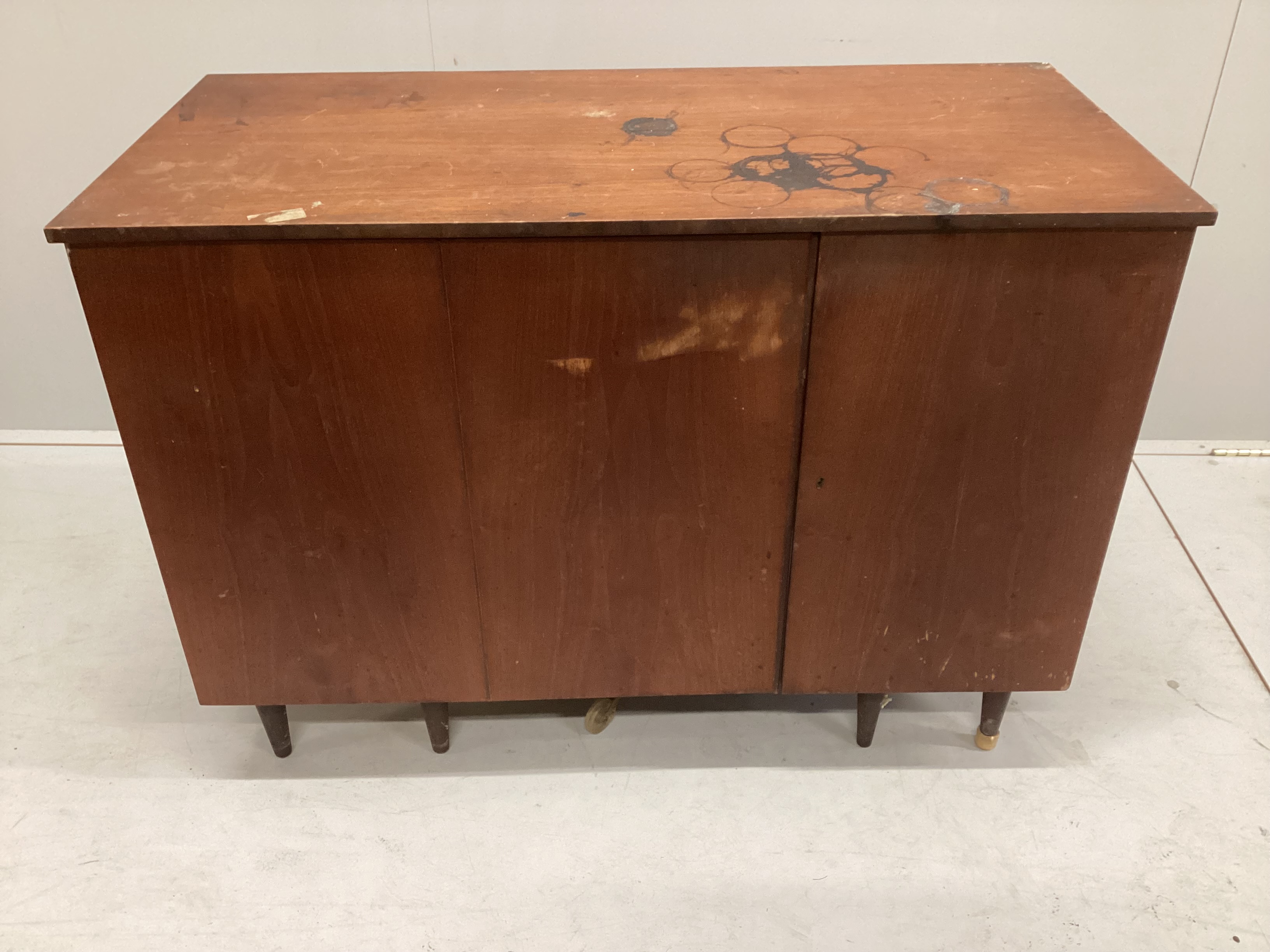 A mid century teak enclosed desk, width 106cm, depth 51cm, height 78cm